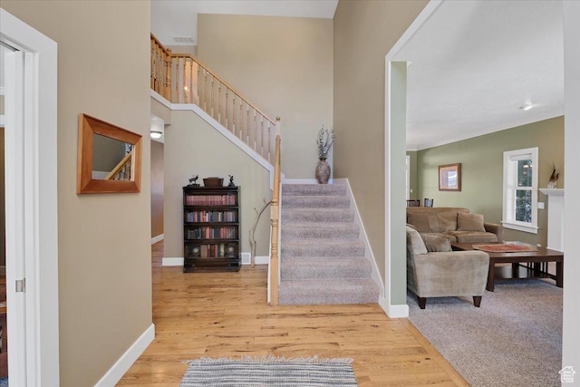 243 Eastridge E, Logan, UT 84321 - stairway with wood finished floors and baseboards