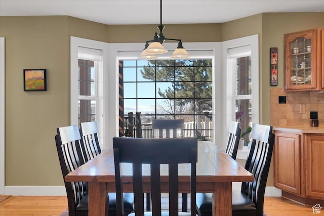 243 Eastridge E, Logan, UT 84321 - dining space with light wood finished floors and baseboards