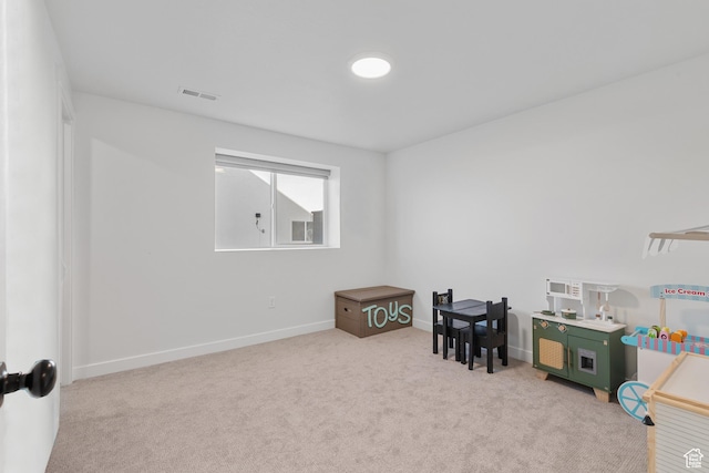 playroom featuring carpet flooring, visible vents, and baseboards