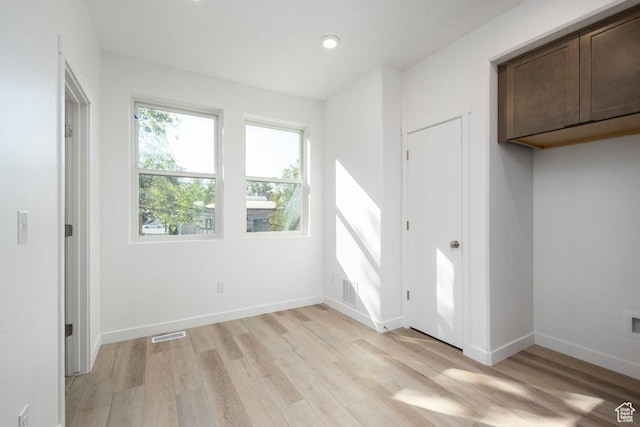 277 W 430 N Unit 1-03, Salt Lake City, UT 84103 - unfurnished bedroom featuring light wood-style floors, baseboards, and recessed lighting