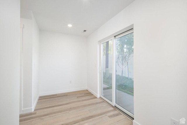 277 W 430 N Unit 1-03, Salt Lake City, UT 84103 - empty room featuring wood finished floors, recessed lighting, and baseboards