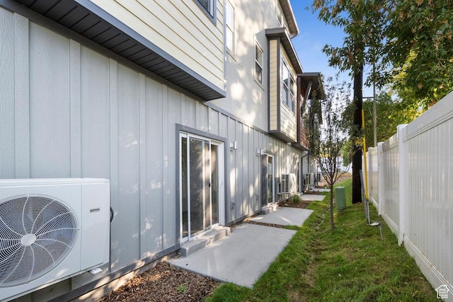 277 W 430 N Unit 1-03, Salt Lake City, UT 84103 - view of home's exterior with ac unit and board and batten siding