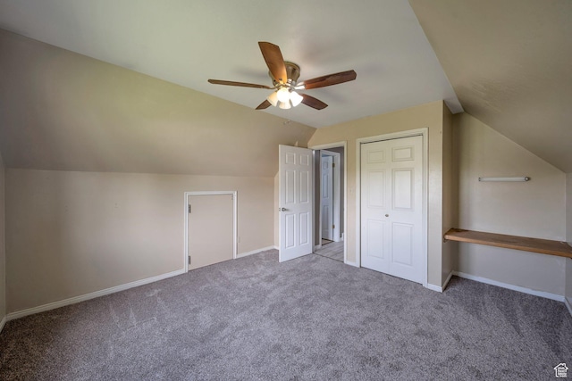 bonus room featuring baseboards, ceiling fan, carpet, and vaulted ceiling