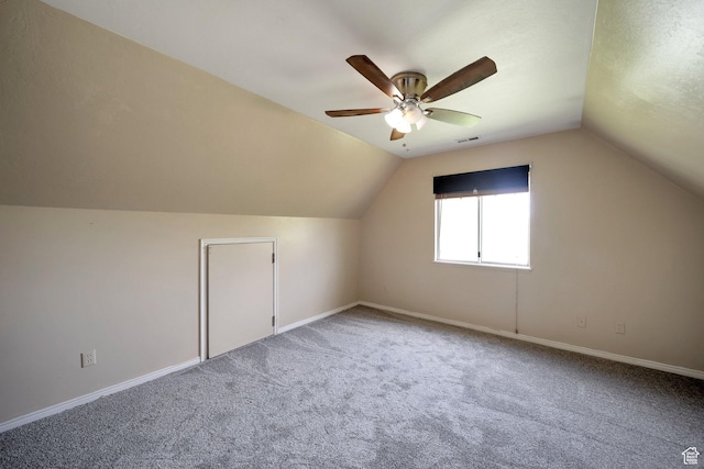 bonus room with visible vents, a ceiling fan, vaulted ceiling, and carpet floors
