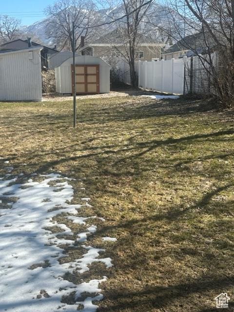 143 N 150 W, Tooele, UT 84074 - view of yard with an outbuilding, fence, and a shed