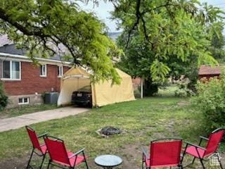 1105 9th St, Ogden, UT 84404 - view of green lawn with driveway
