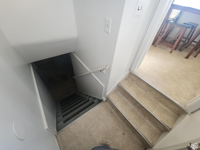 1105 9th St, Ogden, UT 84404 - stairway featuring tile patterned flooring