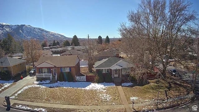1105 9th St, Ogden, UT 84404 - ranch-style house with fence, a residential view, and a mountain view