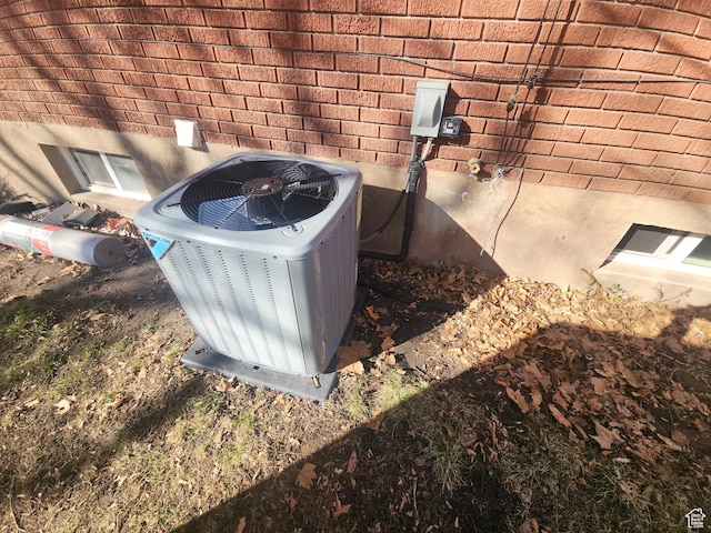 1105 9th St, Ogden, UT 84404 - exterior view of cooling unit and brick siding