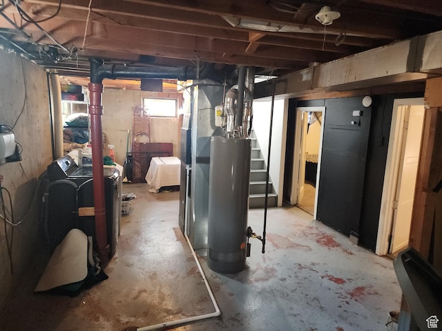 1105 9th St, Ogden, UT 84404 - unfinished basement featuring washer and clothes dryer, gas water heater, and stairway
