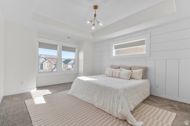 4927 W Yellow Topaz Dr, Herriman, UT 84096 - carpeted bedroom with a chandelier, a tray ceiling, and baseboards