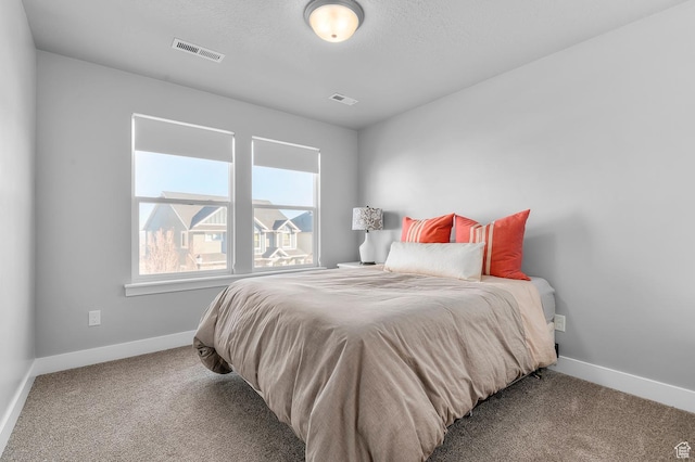 4927 W Yellow Topaz Dr, Herriman, UT 84096 - carpeted bedroom featuring a textured ceiling, visible vents, and baseboards