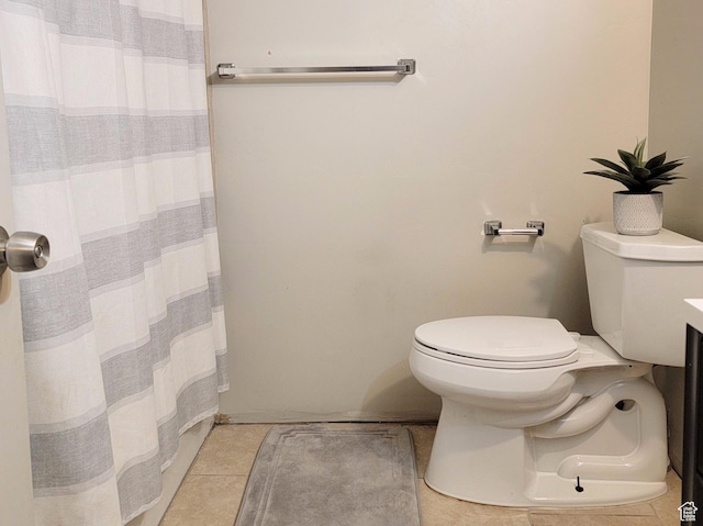 6583 W Annie Lee Way, West Jordan, UT 84081 - bathroom with curtained shower, toilet, and tile patterned flooring