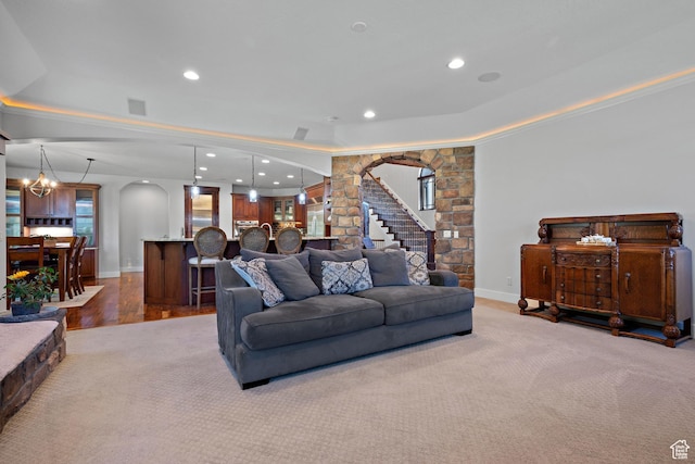 267 E Lucky Star Way, Farmington, UT 84025 - carpeted living room featuring arched walkways, baseboards, recessed lighting, and a chandelier