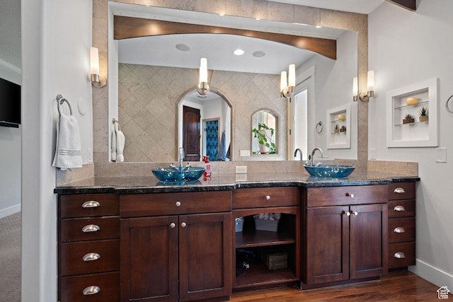 267 E Lucky Star Way, Farmington, UT 84025 - bathroom featuring baseboards, double vanity, wood finished floors, and backsplash
