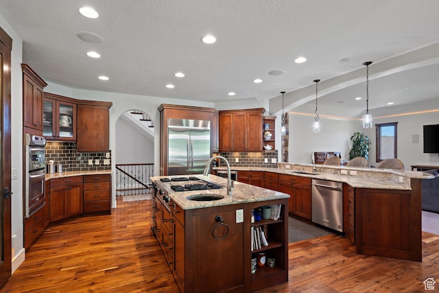 267 E Lucky Star Way, Farmington, UT 84025 - kitchen featuring open shelves, stainless steel appliances, a peninsula, dark wood-style floors, and recessed lighting