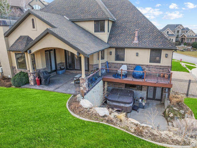 267 E Lucky Star Way, Farmington, UT 84025 - rear view of house featuring stucco siding, a hot tub, and a patio area