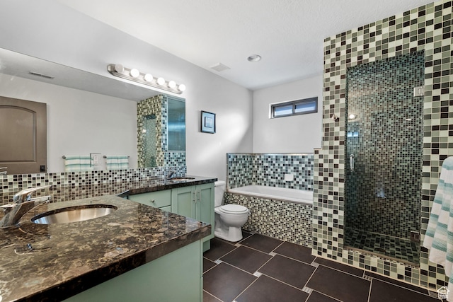 267 E Lucky Star Way, Farmington, UT 84025 - full bath featuring a shower stall, a garden tub, tile patterned floors, backsplash, and two vanities
