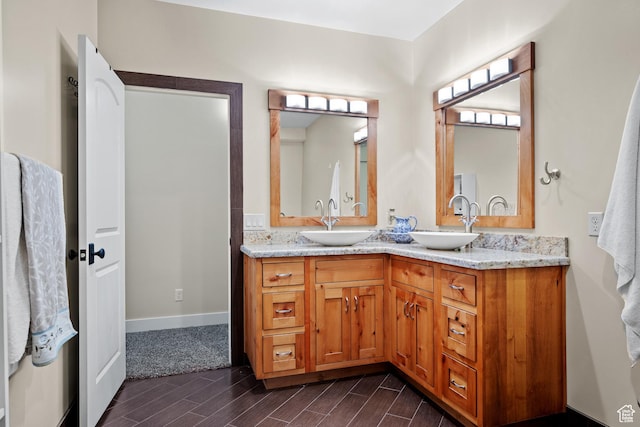 267 E Lucky Star Way, Farmington, UT 84025 - full bath with wood finish floors, double vanity, and baseboards