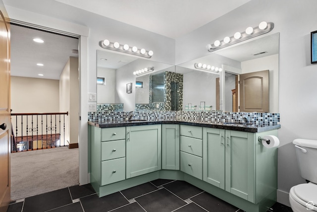 267 E Lucky Star Way, Farmington, UT 84025 - full bathroom featuring toilet, backsplash, tile patterned flooring, double vanity, and recessed lighting