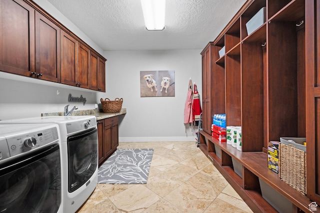 267 E Lucky Star Way, Farmington, UT 84025 - laundry room with cabinet space, baseboards, independent washer and dryer, a textured ceiling, and light stone finish floors