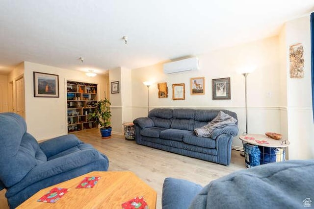 560 E S Temple N Pl 102, Salt Lake City, UT 84102 - living area featuring a wall unit AC and wood finished floors