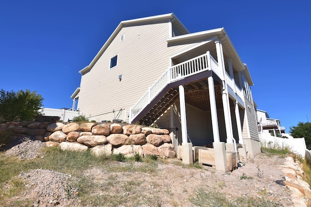 2292 N Elderberry Dr W, Saratoga Springs, UT 84045 - view of side of property with stairway, fence, and a wooden deck