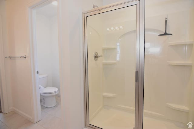 2292 N Elderberry Dr W, Saratoga Springs, UT 84045 - bathroom featuring tile patterned flooring, a shower stall, and toilet