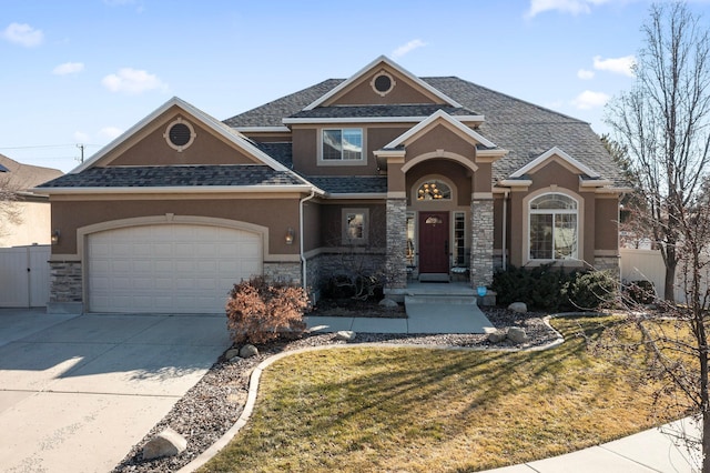 craftsman inspired home with stucco siding, a garage, driveway, and stone siding
