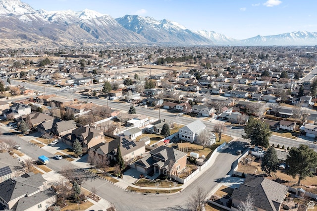 aerial view of residential area with a mountain backdrop