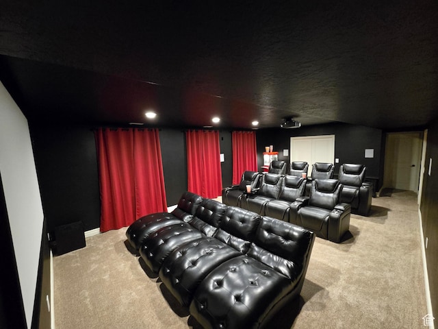 carpeted home theater room featuring recessed lighting and baseboards