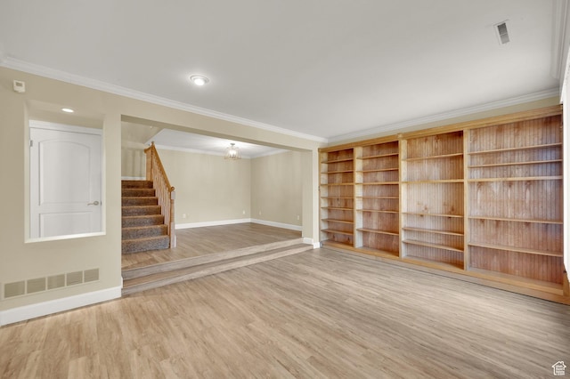 3240 Shadowbrook Dr, Provo, UT 84604 - below grade area with stairway, wood finished floors, visible vents, and baseboards