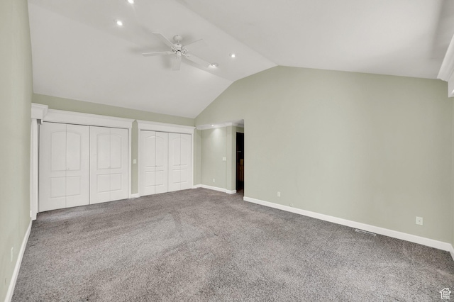 3240 Shadowbrook Dr, Provo, UT 84604 - unfurnished bedroom featuring carpet floors, baseboards, vaulted ceiling, and two closets