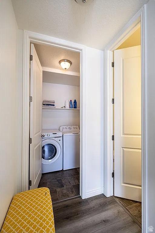 1042 W 500 S, Provo, UT 84601 - washroom with a textured ceiling, washer and clothes dryer, and dark wood finished floors