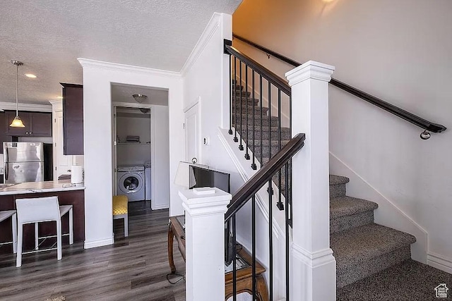 1042 W 500 S, Provo, UT 84601 - stairway featuring baseboards, ornamental molding, wood finished floors, a textured ceiling, and washing machine and dryer