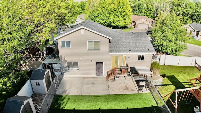 3320 S 1350 W, Perry, UT 84302 - back of house featuring a patio area and a shingled roof