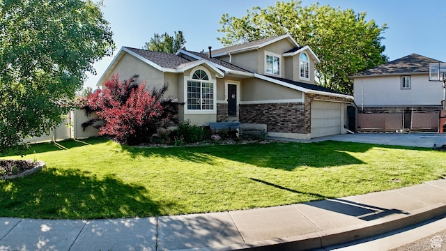3320 S 1350 W, Perry, UT 84302 - view of front facade with stucco siding, brick siding, and driveway
