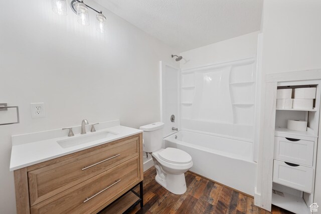 524 N 200 W, Tooele, UT 84074 - full bathroom with wood finished floors, vanity, and bathing tub / shower combination