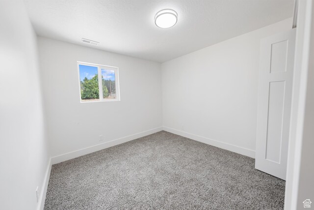 524 N 200 W, Tooele, UT 84074 - carpeted empty room featuring baseboards