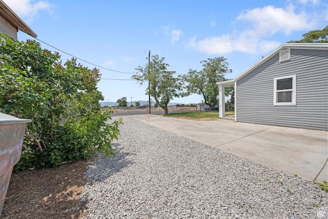 524 N 200 W, Tooele, UT 84074 - view of yard featuring gravel driveway