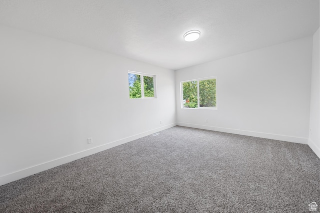 524 N 200 W, Tooele, UT 84074 - carpeted empty room with baseboards