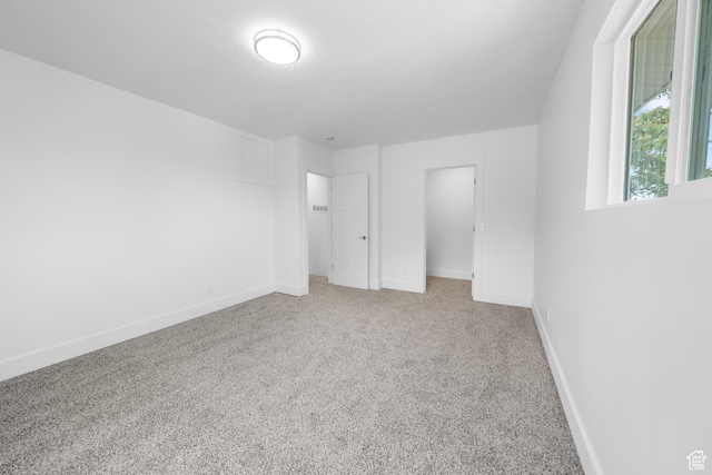 524 N 200 W, Tooele, UT 84074 - unfurnished bedroom featuring baseboards and carpet
