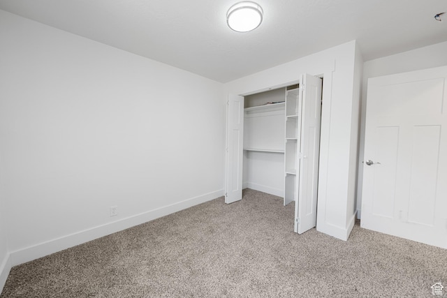 524 N 200 W, Tooele, UT 84074 - unfurnished bedroom featuring light carpet and a closet