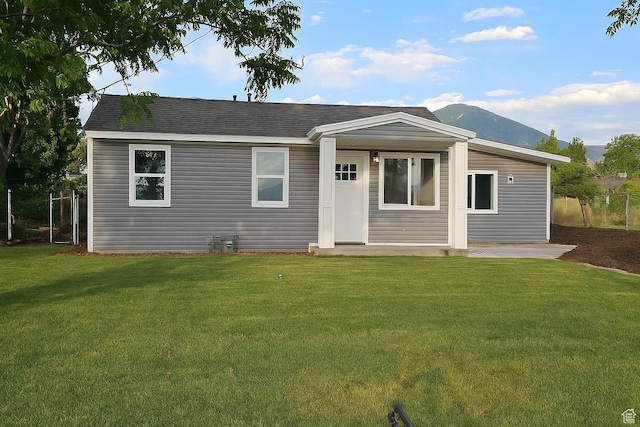 524 N 200 W, Tooele, UT 84074 - view of front facade with a mountain view and roof with shingles