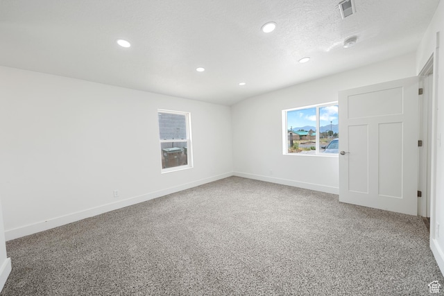 524 N 200 W, Tooele, UT 84074 - empty room with recessed lighting, light colored carpet, and a textured ceiling