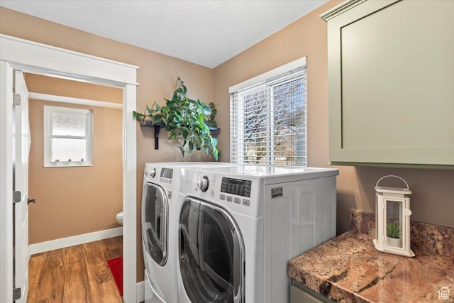 1004 W 4050 S, Riverdale, UT 84405 - clothes washing area with laundry area, baseboards, washer and clothes dryer, wood finished floors, and a textured ceiling