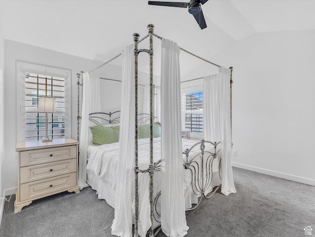 bedroom with a ceiling fan, lofted ceiling, carpet flooring, and baseboards