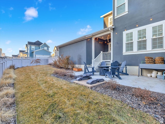 view of yard with a patio and fence
