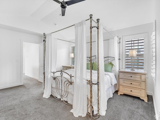 bedroom featuring carpet, baseboards, and a ceiling fan