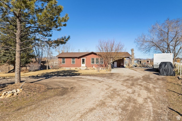 879 E Main St, Mount Pleasant, UT 84647 - single story home featuring dirt driveway and brick siding